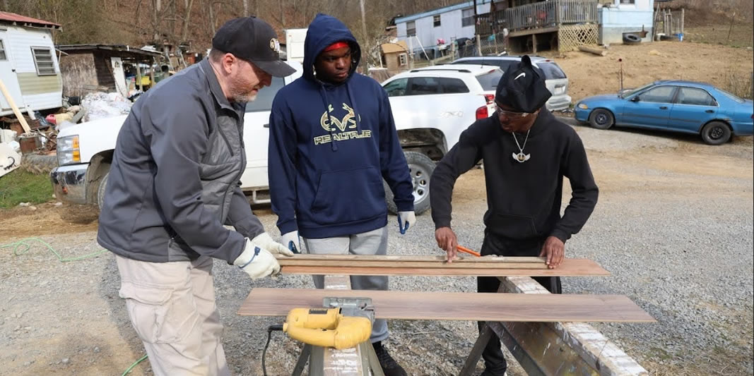 group students working with tools