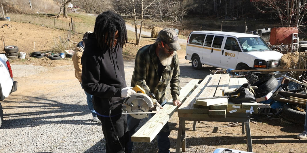 group students working with tools